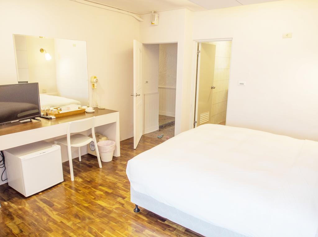 Summer Aura B&B Shanjiao Quarto foto